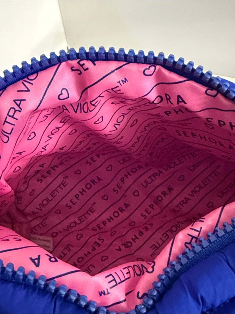 Sephora x Ultra Violette puffer cosmetic bag & sunscreen